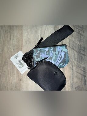 Lululemon Dual Pouch Wristlet Floral camo and gunmetal